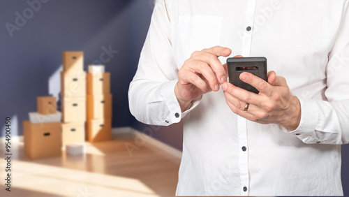 Mobile phone in hands of bu...