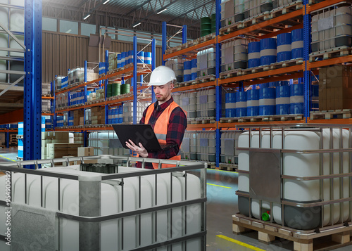Man in chemical warehouse. ...