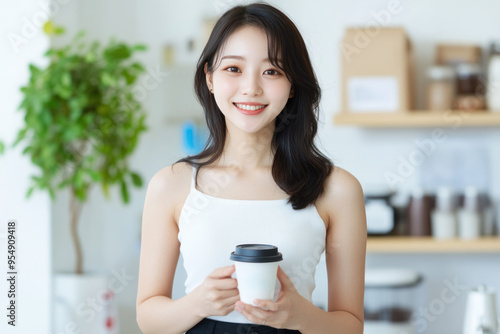 Korean Woman Smile Wearing White Cloth Holding Cup of Coffee