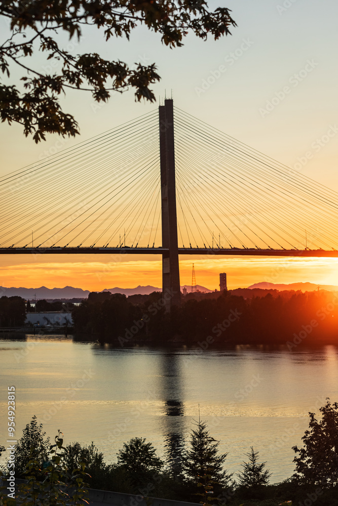Obraz premium Port Mann Bridge. Port Mann Bridge over Fraser River at sunset. Vancouver, BC, Canada. Bridges and structures.