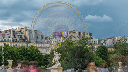 Ferris wheel Roue de Paris on Tuileries Garden timelapse. Paris, France. photo