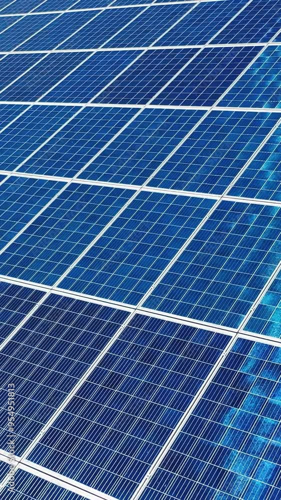 Detail shot of solar panel. Background of photovoltaic modules for renewable energy. Vertical video Detail shot of solar panel. Background of photovoltaic modules for renewable energy. Vertical video