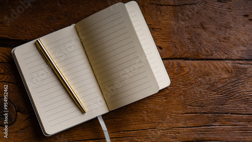 Notepad and Pen on a Wooden Surface