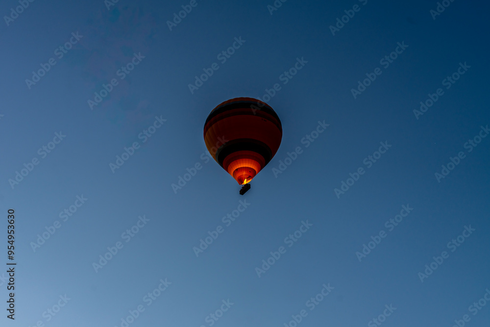 Fototapeta premium Hot air balloons rising early in the morning