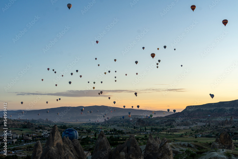 Hot air balloons rising early in the morning Hot air balloons rising early in the morning