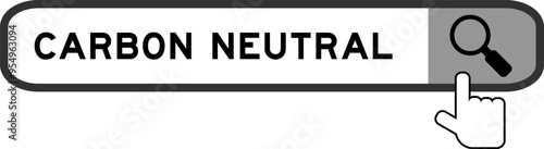 Search banner in word carbon neutral with hand over magnifier icon on white background
