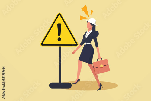 A career woman wearing a project helmet stands next to a warning sign, as a symbol of employee safety while working