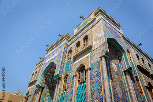 Canvas Print Ali Ibn Abi Talib Mosque (Iranian Mosque Hosainia) facade, colorful Shia Iranian mosque in Bur Dubai, Deira with Persian faience tilework and Islamic calligraphy