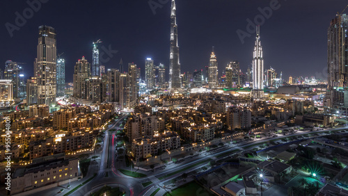Wallpaper Mural Dubai Downtown skyline night timelapse with Burj Khalifa and other towers panoramic view from the top in Dubai Torontodigital.ca