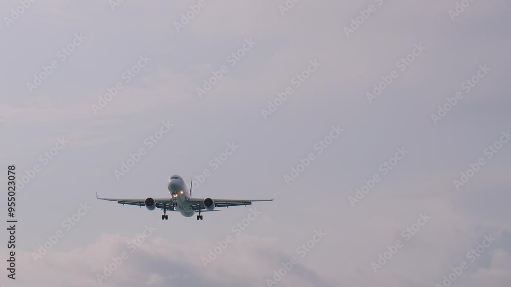 White passenger airplane gains altitude after taking off from the airport, soaring into a cloudy sky. The scene captures the excitement of air travel and the beauty of flight White passenger airplane gains altitude after taking off from the airport, soaring into a cloudy sky. The scene captures the excitement of air travel and the beauty of flight