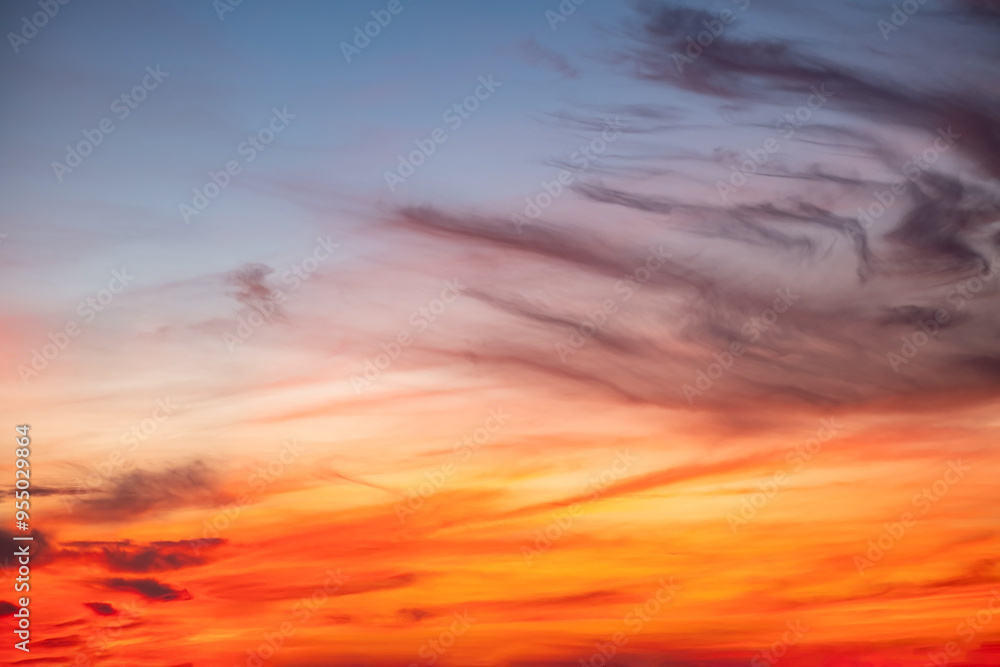 Fototapeta premium Beautiful , luxury soft gradient orange gold clouds and sunlight on the blue sky perfect for the background, take in everning,Twilight, Large size, high definition landscape photo