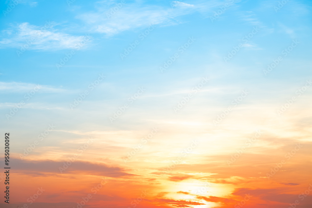 Beautiful , luxury soft gradient orange gold clouds and sunlight on the blue sky perfect for the background, take in everning,Twilight, Large size, high definition landscape photo Beautiful , luxury soft gradient orange gold clouds and sunlight on the blue sky perfect for the background, take in everning,Twilight, Large size, high definition landscape photo