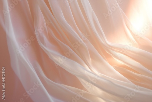 A glowing, translucent curtain of sheer fabric gently flowing against a backdrop of pale blush pink. 