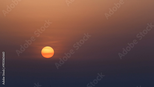 Sunrise with cityscape of Ajman from rooftop aerial timelapse.