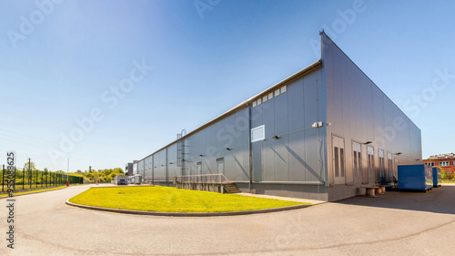 Network servers in a data center. Tier III carrier neutral data center. Server rooms.