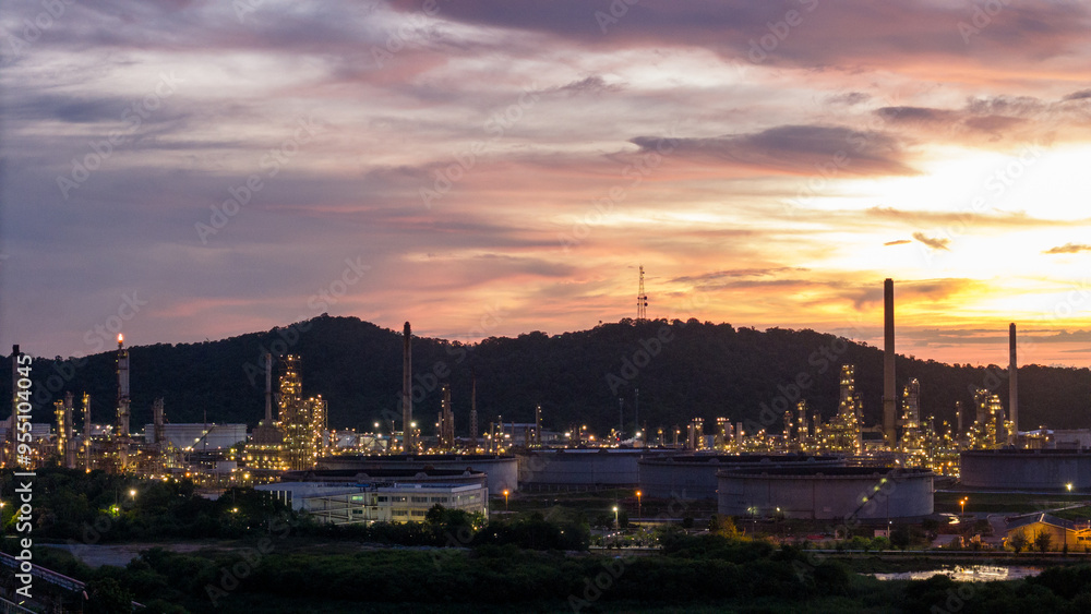 Oil Refinery plant at sunset. Gas Chemical Equipment Prodiction import export Concept, Crude Oil Refinery Plant Steel Pump Pipe line and Chimney and Cooling tower, Chemical Petrochemical Oil Refinery plant at sunset. Gas Chemical Equipment Prodiction import export Concept, Crude Oil Refinery Plant Steel Pump Pipe line and Chimney and Cooling tower, Chemical Petrochemical