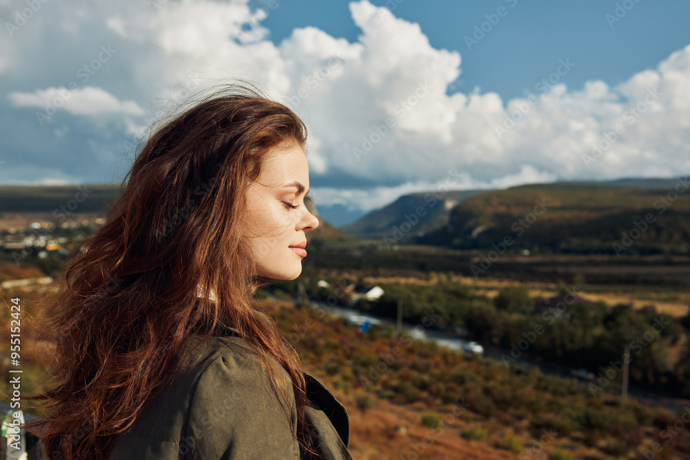Obraz premium Serene woman admiring majestic mountains and clouds in scenic valley landscape travel, nature, beauty, relaxation, contemplation