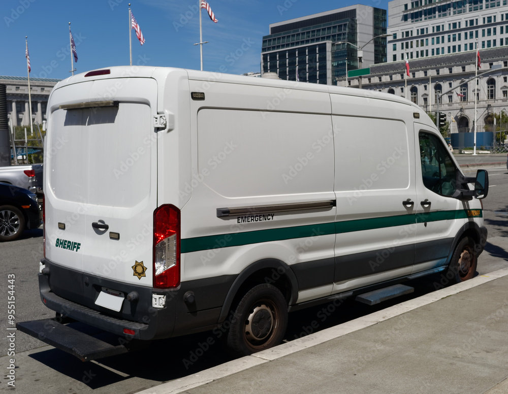 Sheriff's van parked in urban setting Sheriff's van parked in urban setting