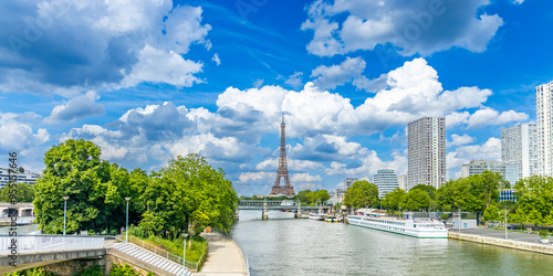 Photography Ile aux Cygnes, Beaugrenelle towers and Eiffel Tower on beautiful day of springt