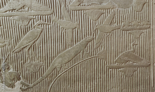 Obraz na plátně A scene in relief in the tomb of the vizier Mereruka showing a papyrus thicket teeming with animals and birds