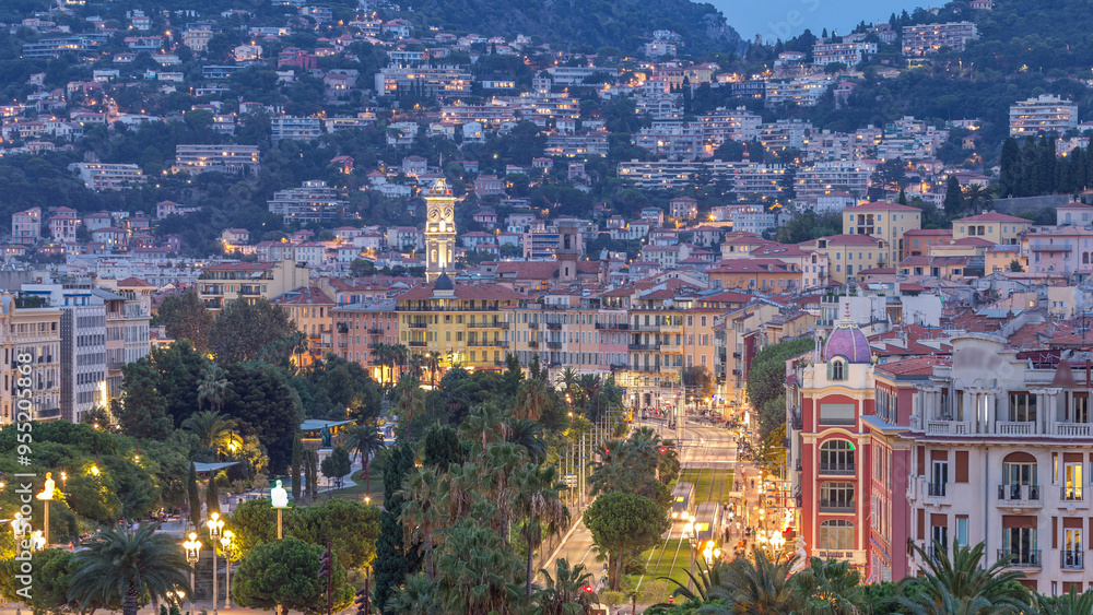 Obraz premium Evening aerial panorama of Nice day to night timelapse, France. Lighted Old Town little streets and Massena square after sunset
