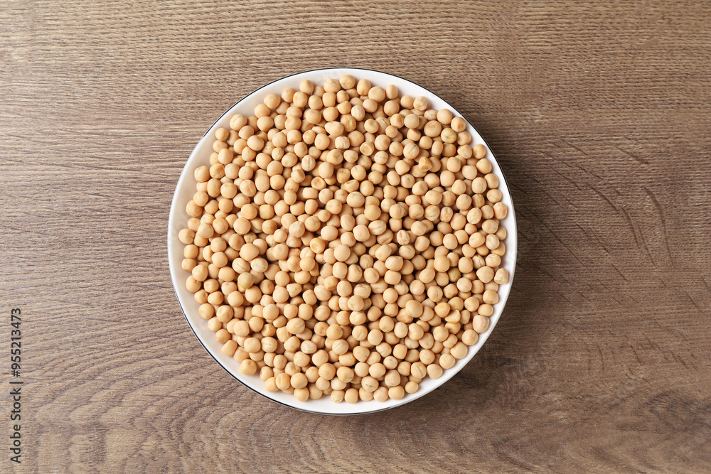 Dried peas on wooden table, top view Dried peas on wooden table, top view
