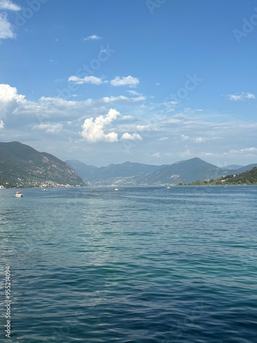 Landscape of Italy with lake and mountains.