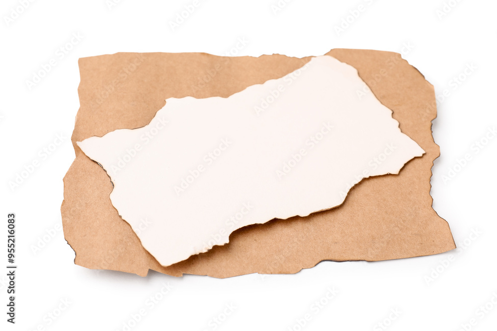Pieces of old paper with dark burnt borders isolated on white Pieces of old paper with dark burnt borders isolated on white