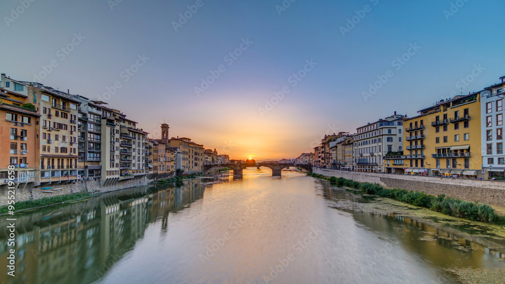 Cityscape view on Arno river with famous Holy Trinity bridge timelapse on the sunset in Florence Cityscape view on Arno river with famous Holy Trinity bridge timelapse on the sunset in Florence