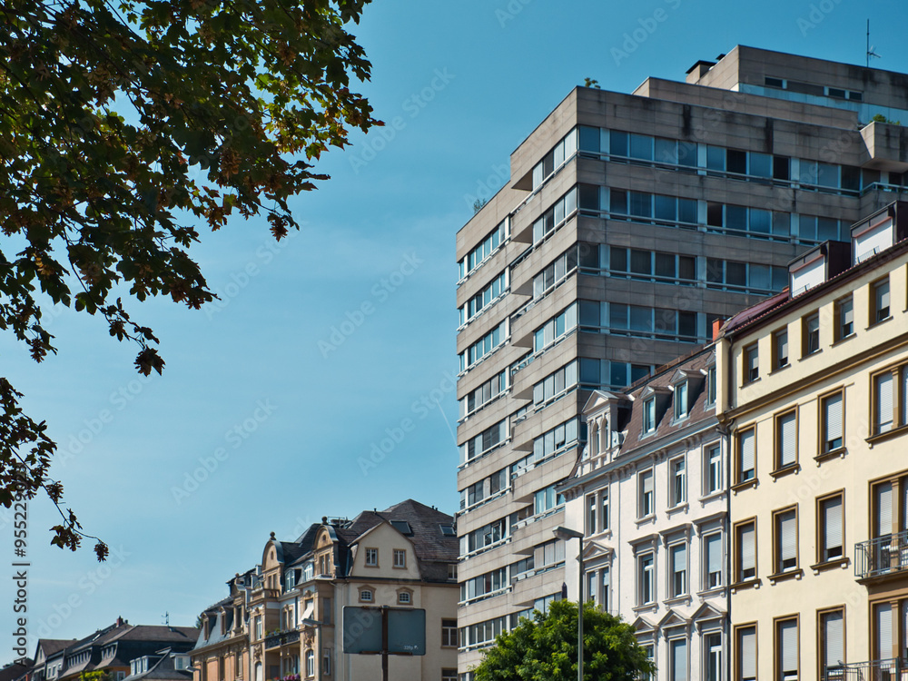 Fototapeta premium large office complex, as it has double the height of neighboring historic buildings and is located right in the middle