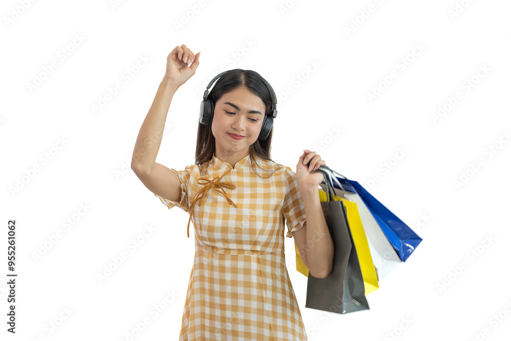 Happy Asian woman holding shopping bags isolated on white background Happy Asian woman holding shopping bags isolated on white background