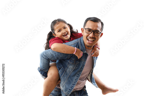 Happy man carrying his sweet beautiful 7 years old daughter on his back looking at the camera. Isolated on white