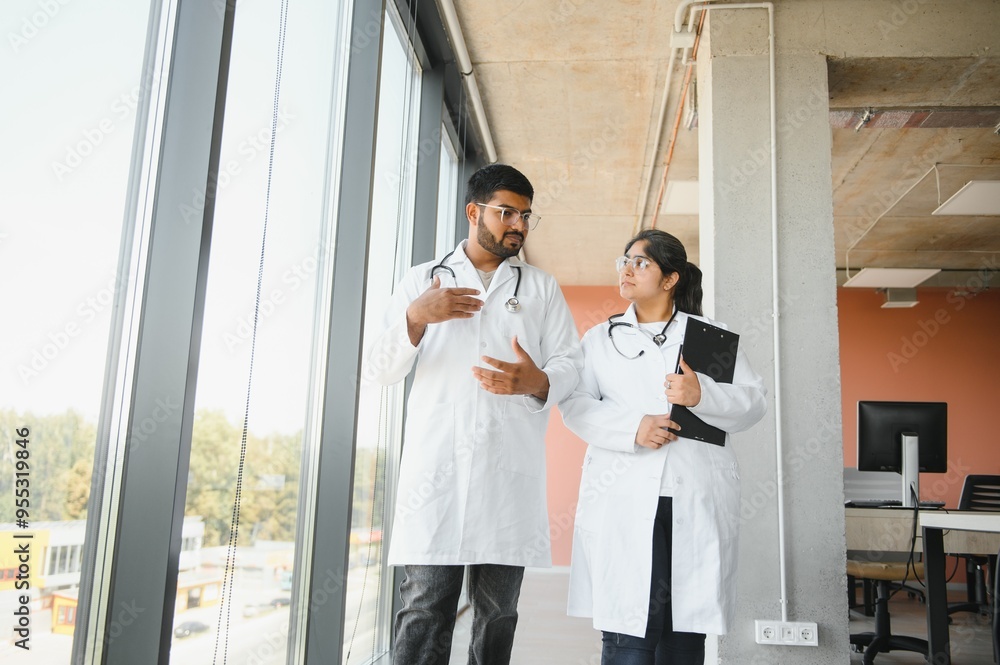 Indian young male and female doctor Indian young male and female doctor