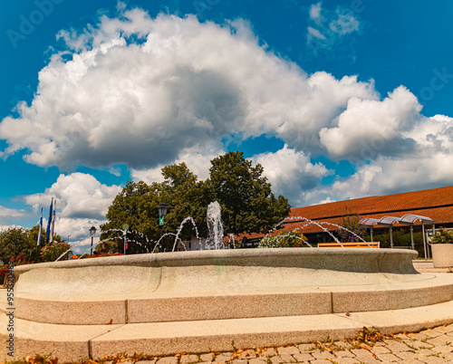 High resolution stitched summer panorama with a fountain at Therme Bad Griesbach, Bavaria, Germany photo