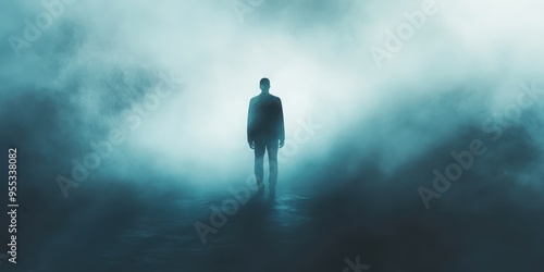 A shadowy figure standing in the fog 