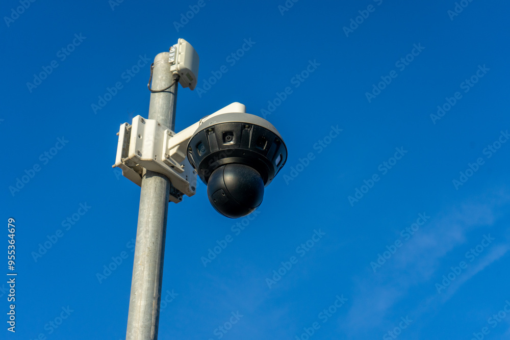 Surveillance camera at Praia da Rocha, Algarve, Portugal, ensuring beach safety by monitoring activities and enhancing public security in a popular tourist destination. Surveillance camera at Praia da Rocha, Algarve, Portugal, ensuring beach safety by monitoring activities and enhancing public security in a popular tourist destination.