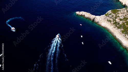 Aerial View of Deep Blue Sea Water with Sailing Boats in a Harbour Marina