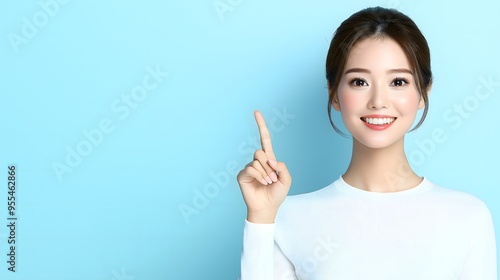 An Asian beauty model gesturing against an isolated background, perfect for a business or commercial wallpaper with blank space for writing.