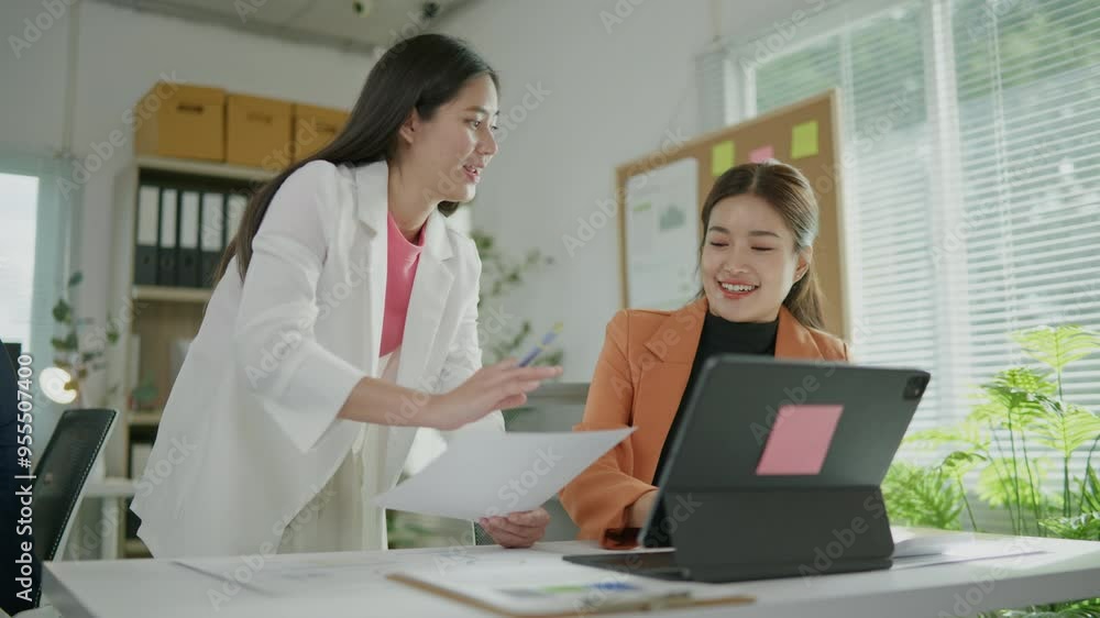 Group of teamwork businesspeople are meeting working and brainstorming about business financial and marketing on paperwork and presentation. Group of teamwork businesspeople are meeting working and brainstorming about business financial and marketing on paperwork and presentation.