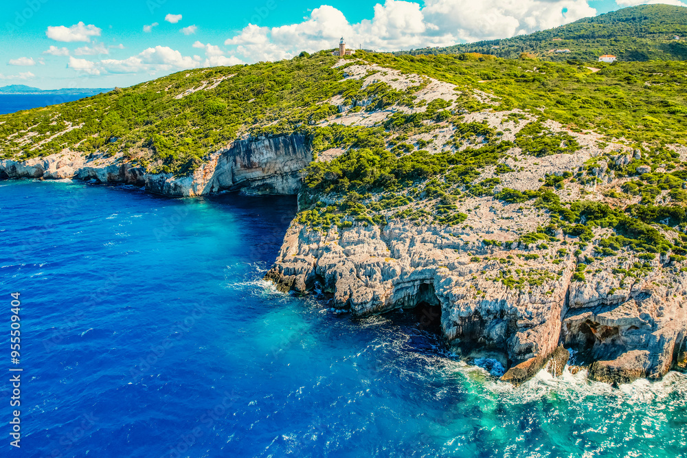 Naklejka premium Blue caves on Zakynthos island or Zante Island, Greece. Beautiful views of azure sea water and nature with cliffs cave