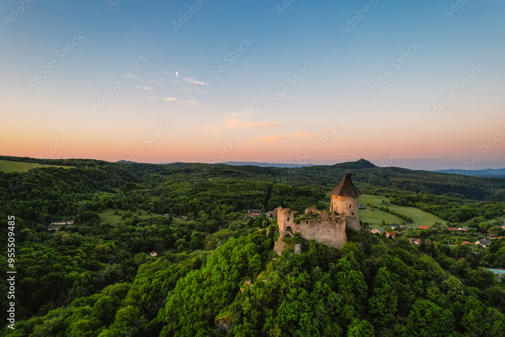 Ruins of a medieval castle Somoska or Somoskoi var. on borders of southern Slovakia and Hungary at sunrise time. Ruins of a medieval castle Somoska or Somoskoi var. on borders of southern Slovakia and Hungary at sunrise time.