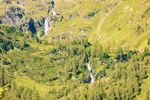 Alpine summer view with waterfalls at Felbertauern road, Salzburg, Tyrol, Austria photo