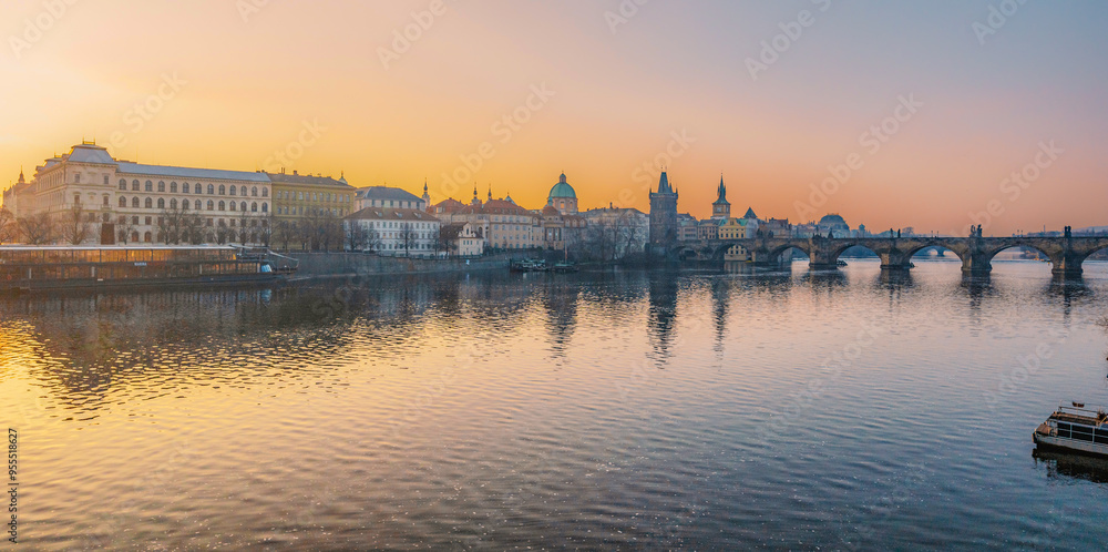 View of the city of Prague. Vltava river with Old Town Bridge Tower on Charles bridge in Prague, Czech Republic. View of the city of Prague. Vltava river with Old Town Bridge Tower on Charles bridge in Prague, Czech Republic.