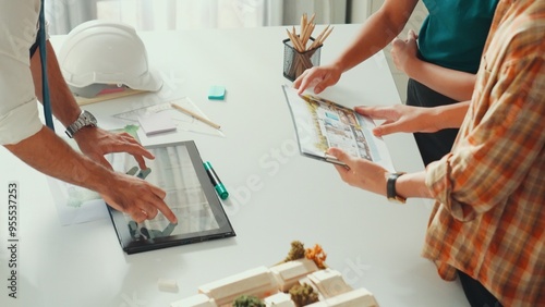 Wallpaper Mural Close up of smart business team hand working together to plan design while looking at project plan from tablet and discussing about blueprint and building construction at meeting table. Alimentation. Torontodigital.ca