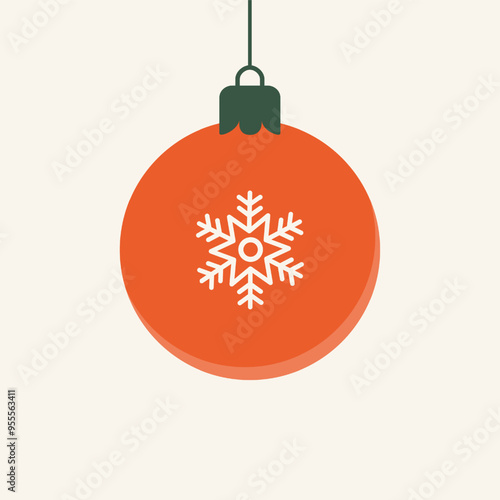 Christmas ball ornament with snowflake design on orange bauble