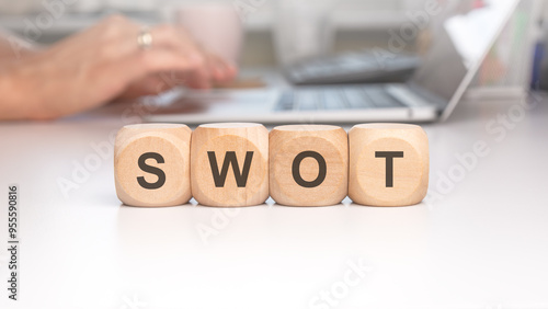 The Concept of SWOT Analysis Presented in a Professional Office Environment or Setting photo