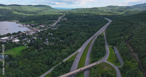 Lake George, NY, USA - August 20 2024, Sunny afternoon summer aerial timelapse video of the area surrounding Lake George, NY, USA	 photo