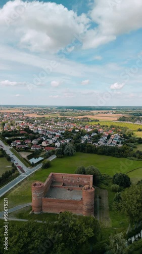 View of the castle in the middle of the forest. Drone view of the castle. A castle in the middle of the forest. The castle in Ciechanów, Poland photo