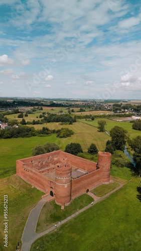 Aerial footage of a drone. View of the castle in the middle of the forest. Drone view of the castle. A castle in the middle of the forest. The castle in Ciechanów, Poland photo