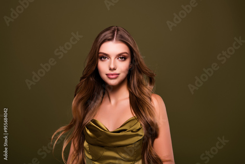 Photo of lovely elegant pretty lady long healthy hair isolated on khaki color background